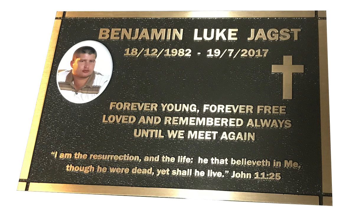 Cast bronze cemetery plaque with a photo, the style used on columbarium niches and cremation memorials