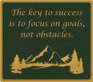 Inspirational bronze plaque with engraved quote and decorative border, designed for motivational wall displays or commemorative installations.