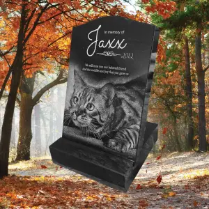 Laser-etched black granite mini pet headstone with engraved photo, name, and tribute text—crafted for durable outdoor placement in gardens or pet cemeteries.