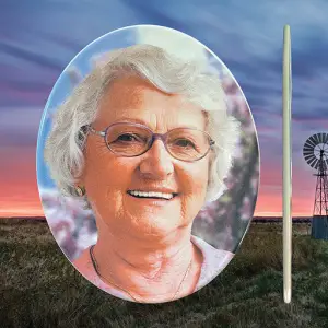 Ceramic photo tiles featuring high-resolution printed images, designed for permanent installation on memorial plaques, headstones, or outdoor tribute walls.